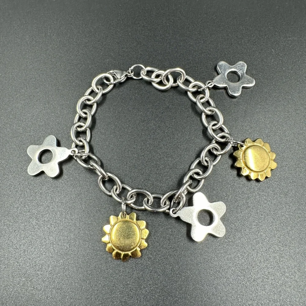 Two Tone Stainless Steel Star and Sun Charm Bracelet